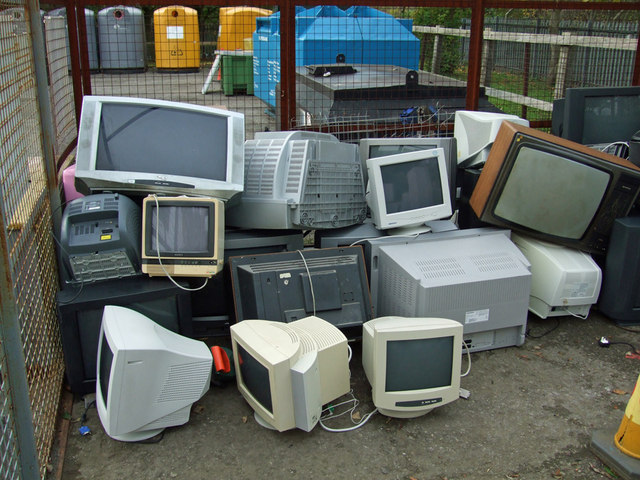 A bunch of dusty old monitors